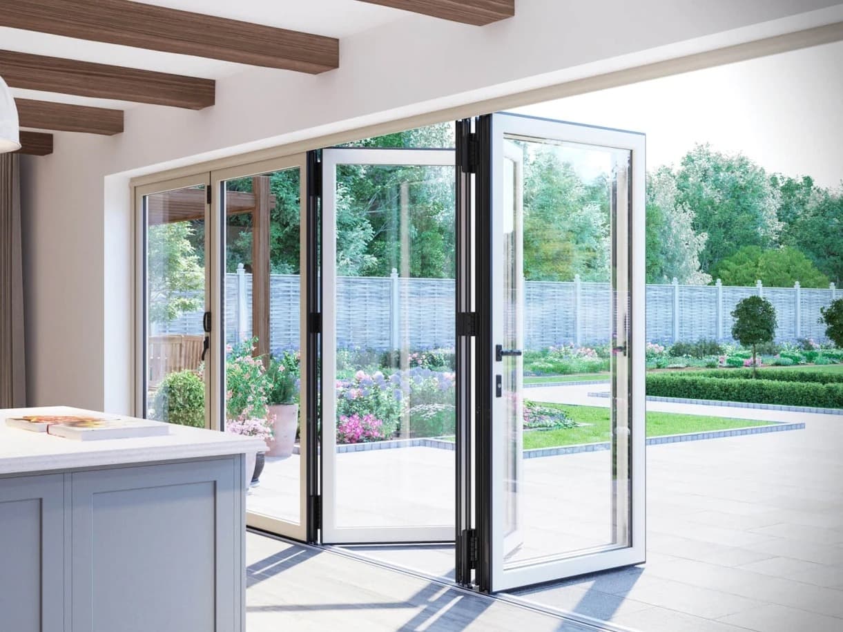 Slim-frame sliding glass doors opening a living space to the outside